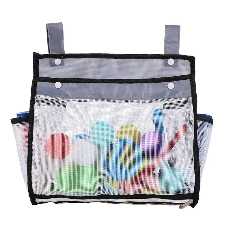 A clear mesh hanging bag organizer for bath toys with a black trim and gray fabric.