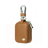 A brown leather protective case with a silver clasp and chain for earphones.