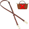 A brown leather crossbody strap with a gold-toned buckle and a matching wallet.