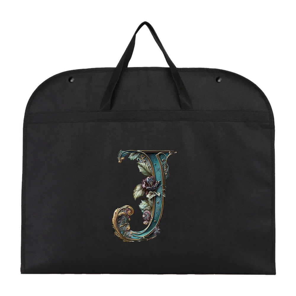 Black fabric dust cover and storage bag with a gold letter J embroidered on it.