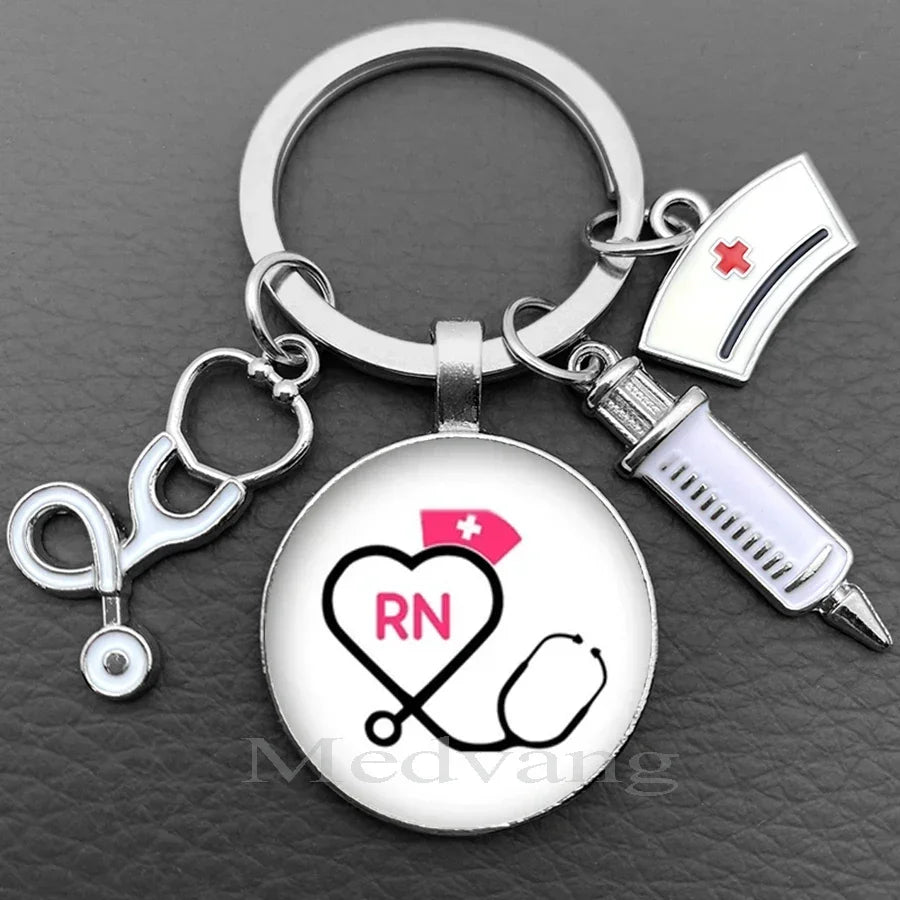 Silver keychain featuring a heart and stethoscope design with the initials RN