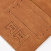 A brown genuine PU leather passport and ticket wallet cover featuring embossed SIM card slots.