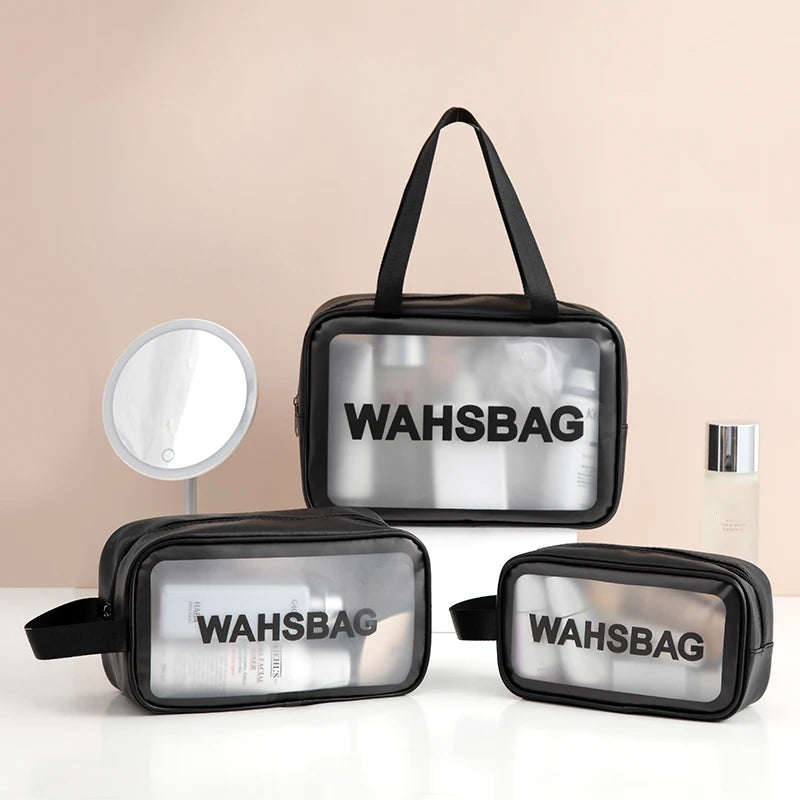 A black waterproof toiletry bag is shown in various forms, including a large rectangular case and a smaller oval pouch.