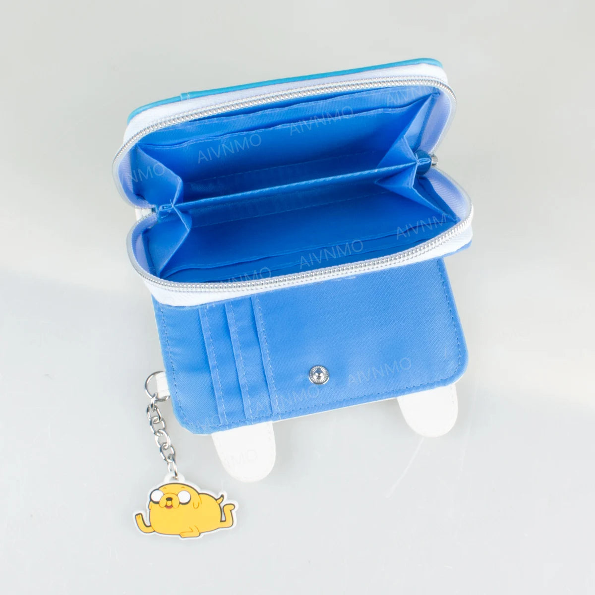A blue anime-themed trifold zipper wallet with an ID window and a yellow charm