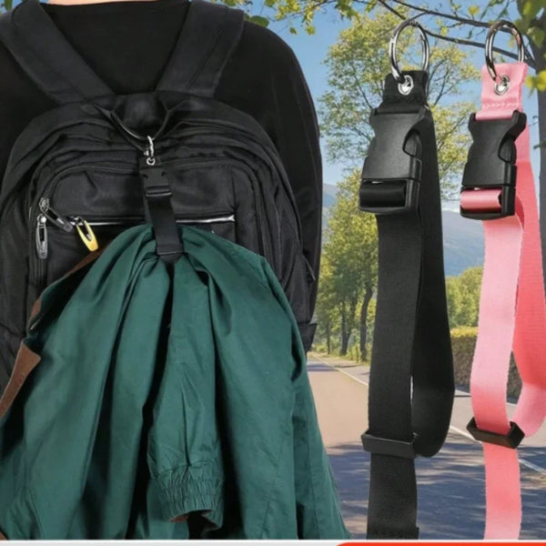 A black backpack with a green fabric item is shown alongside an adjustable luggage hanging strap.