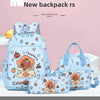 A light blue cartoon animal backpack set featuring cute illustrations and various accessories.
