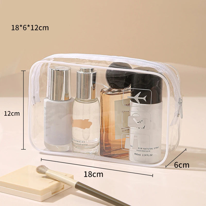 Clear PVC toiletry bag containing perfume bottles and a brush, shown with dimensions.