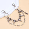 Silver metal purse chain strap for crossbody bags with a decorative spike design