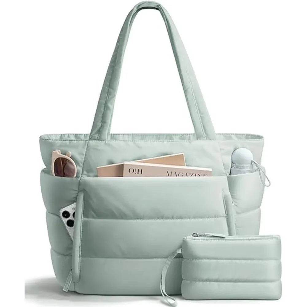 A light mint green quilted puffer tote bag with matching pockets and a separate pouch.