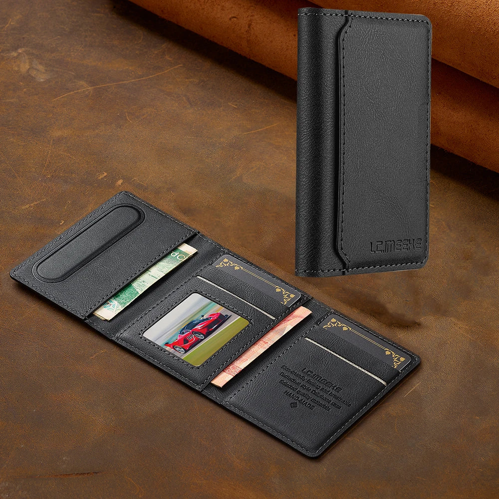 A black multi-card wallet with a leather cover and a phone grip stand resting on a brown surface.