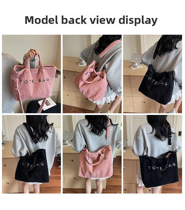 Vue arrière d'un sac à main en velours rayé noir et rose