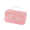 A pink mesh cosmetic organizer pouch with a handle for storing makeup and toiletries.