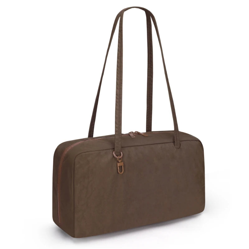 A brown leopard print nylon shoulder tote bag with long leather straps.