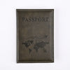 A dark brown leather passport holder with the word PASSPORT embossed and a silhouette of the world map.