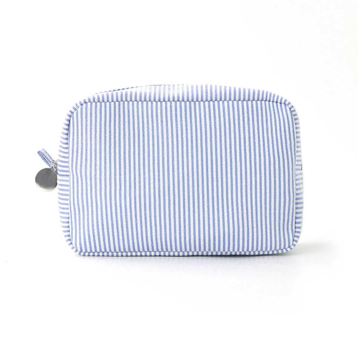 A light blue and white striped seersucker cosmetic bag with a zipper closure.