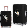 A black suitcase features a white daisy design on the side, shown from the side.