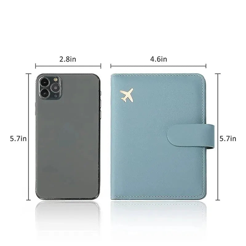 A light blue PU leather passport holder with a flap and credit card slots shown next to a smartphone.