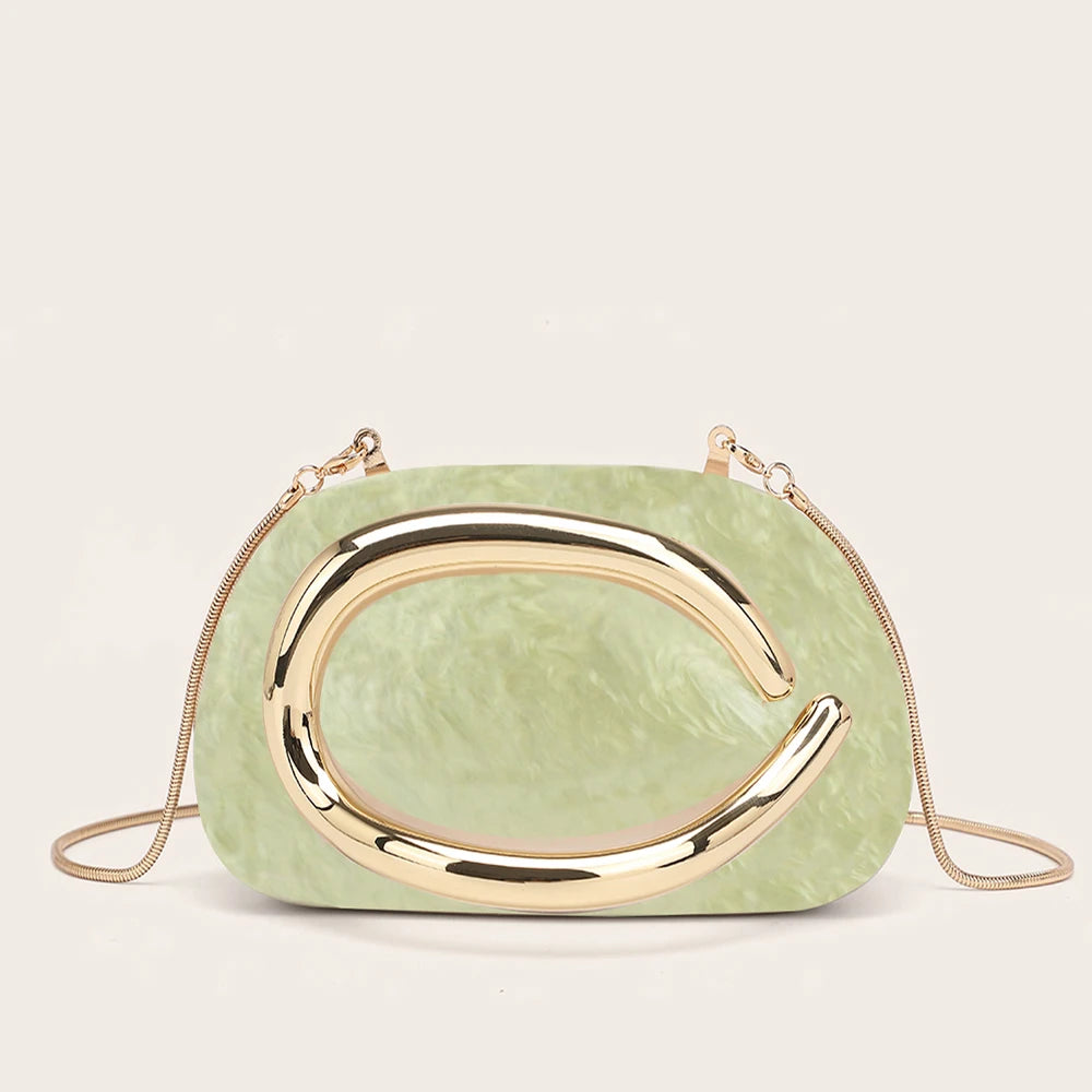 A light green, oval clutch bag with a gold-tone curved detail.