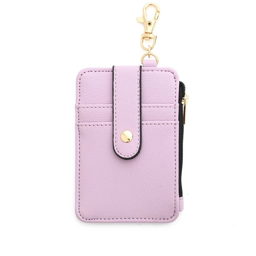 A light purple silicone PU leather key chain wristlet wallet with a gold-tone clasp.