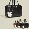 Black waterproof PU leather student messenger bag with a white bear charm
