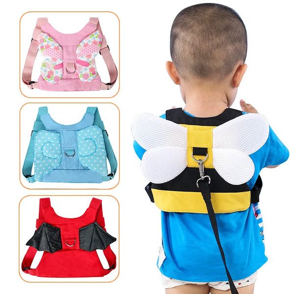 A toddler safety harness and leash set shown in various colors pink blue and red on a child's back.