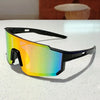 A pair of lightweight, oversized sunglasses with a vibrant gradient lens displaying yellow, green, and blue colors.