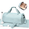 Light blue waterproof travel duffel bag with a shoe compartment and weighing scale visible.