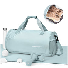 Light blue waterproof travel duffel bag with a shoe compartment and weighing scale visible.