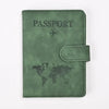 A dark olive green genuine PU leather passport and ticket wallet cover featuring a world map design.
