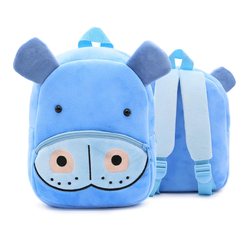 A light blue cartoon animal plush backpack shaped like a horse with large ears and a snout.