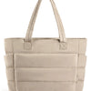 A beige quilted tote bag with a fabric handle is shown from the front.