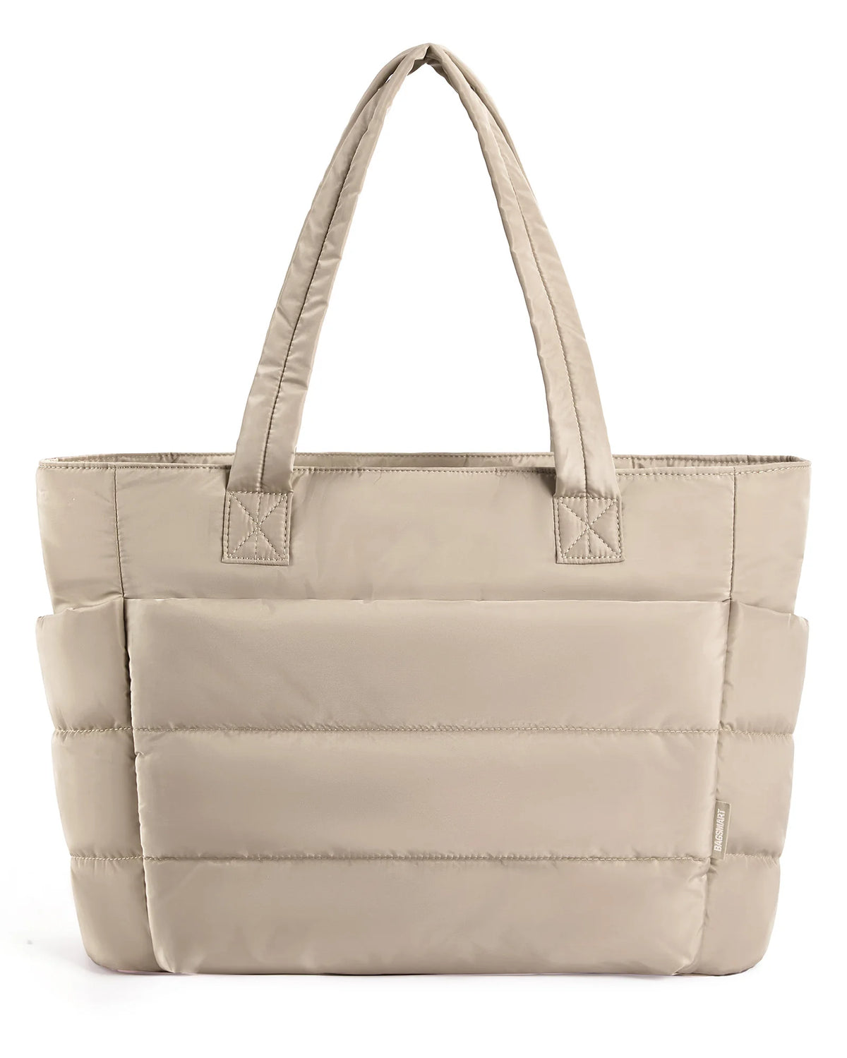 A beige quilted tote bag with a fabric handle is shown from the front.