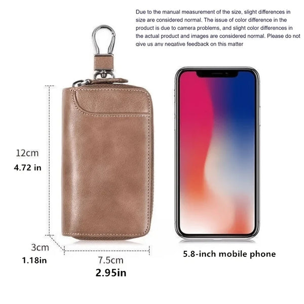 A brown PU leather key organizer wallet next to a smartphone, showing its dimensions.