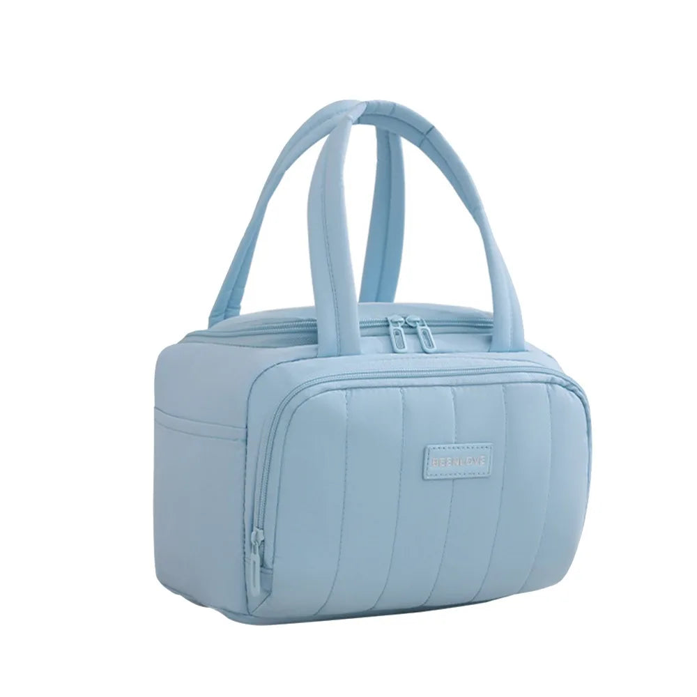 Bolsa reutilizable aislada de color azul claro con asas