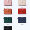 A display of mini crocodile pattern leather card holders in various colors including pink, white, orange, brown, green, and b