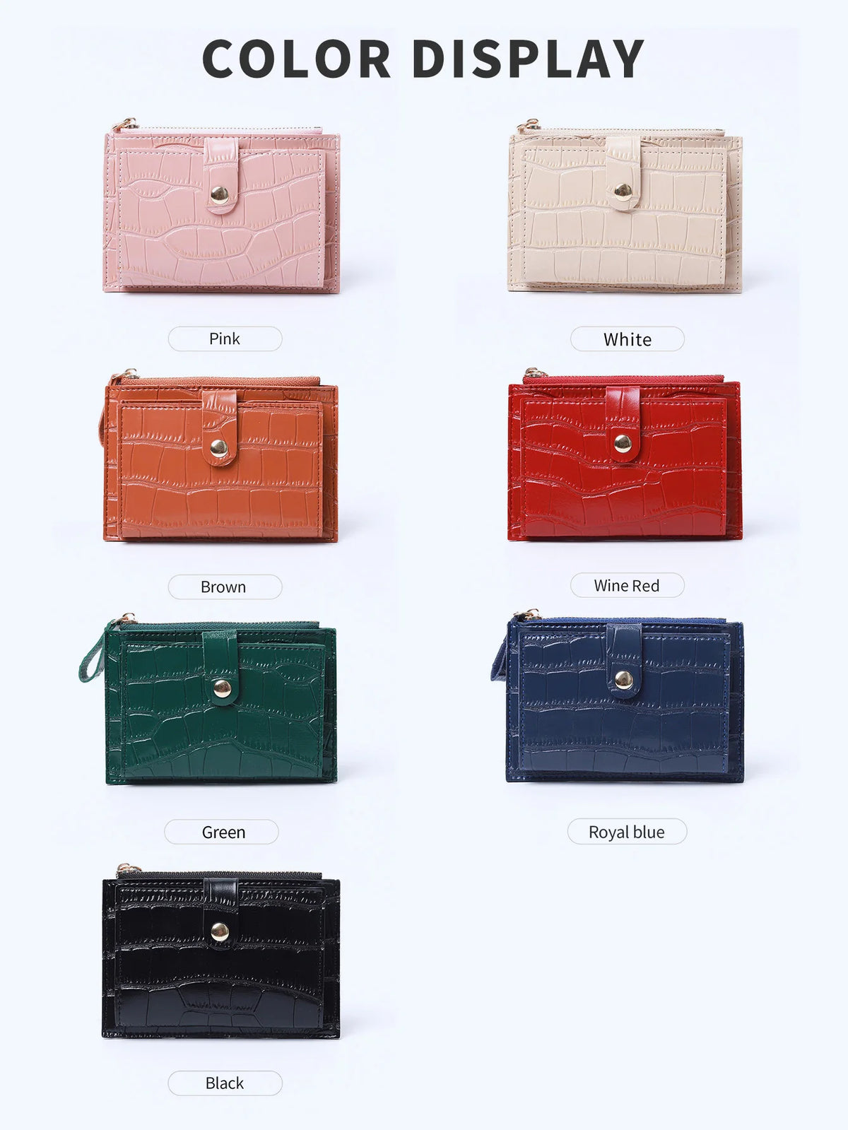 A display of mini crocodile pattern leather card holders in various colors including pink, white, orange, brown, green, and b