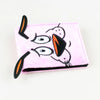 Portefeuille carte avec fausse fourrure rose et broderie anime, accents noir et orange