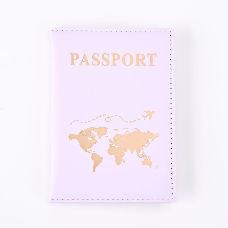 A light purple passport holder wallet with gold foil printing of a world map and the word PASSPORT.