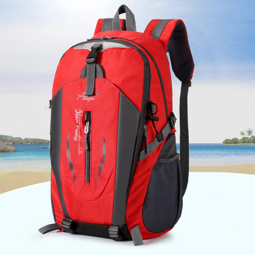 A red and black waterproof hiking backpack is shown against a light blue sea background.