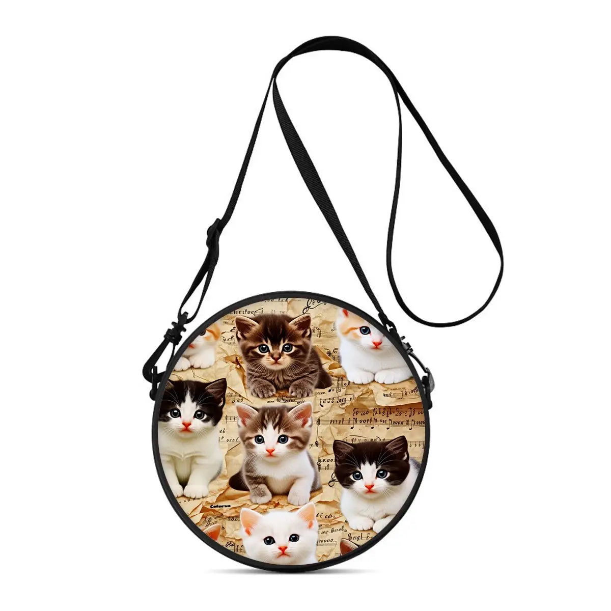 A round black crossbody bag featuring a cartoon cat design with a black strap.