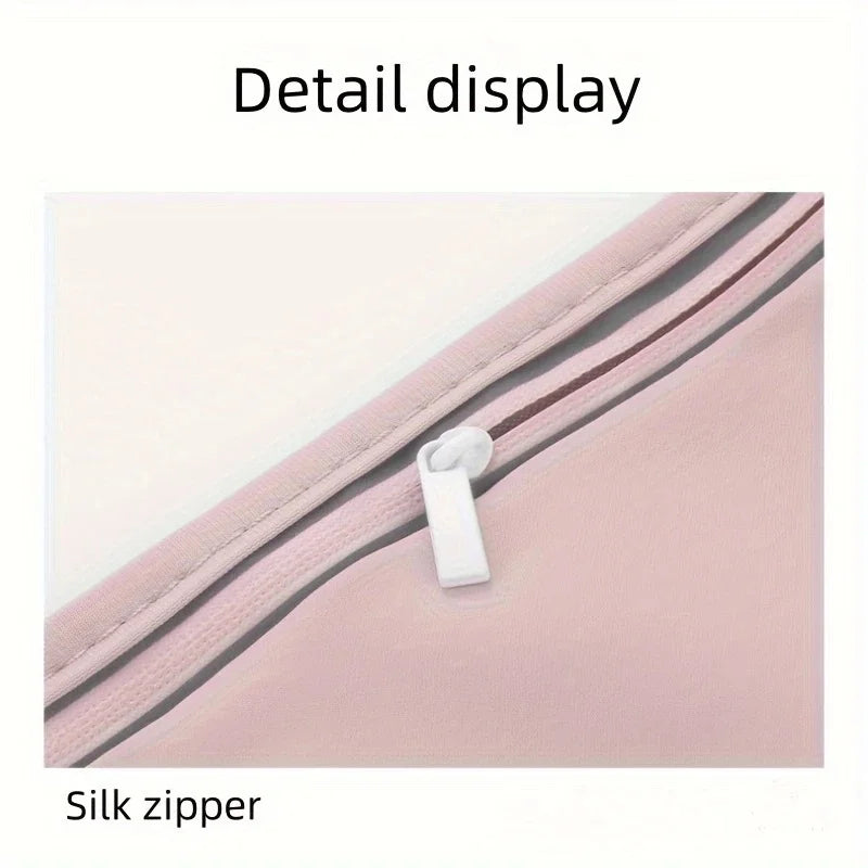 Detail display of a pink silk zipper on a multi-use waist pack.