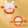 An orange and white teether shaped like a bunny, designed to prevent falling off the hand.