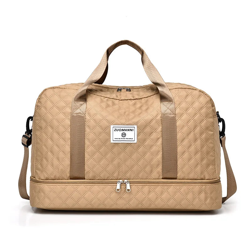 A beige durable nylon travel duffle bag with tan straps and a square label on the front.