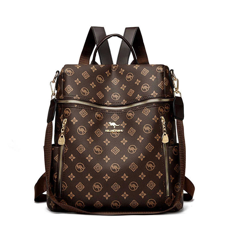 A brown genuine leather women's backpack with gold hardware and a repeating logo pattern.