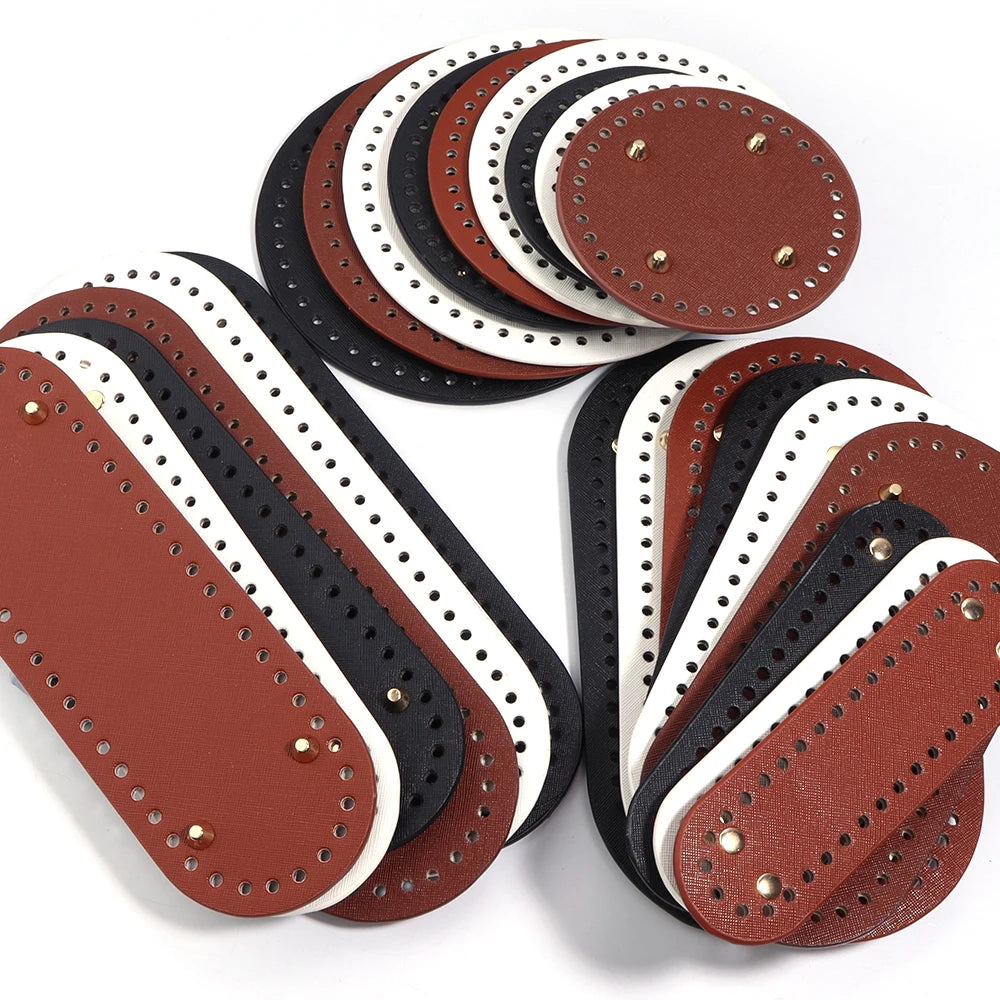 A collection of oval PU leather bag bases with pre-punched holes for crochet and knitting in brown, black, and white.