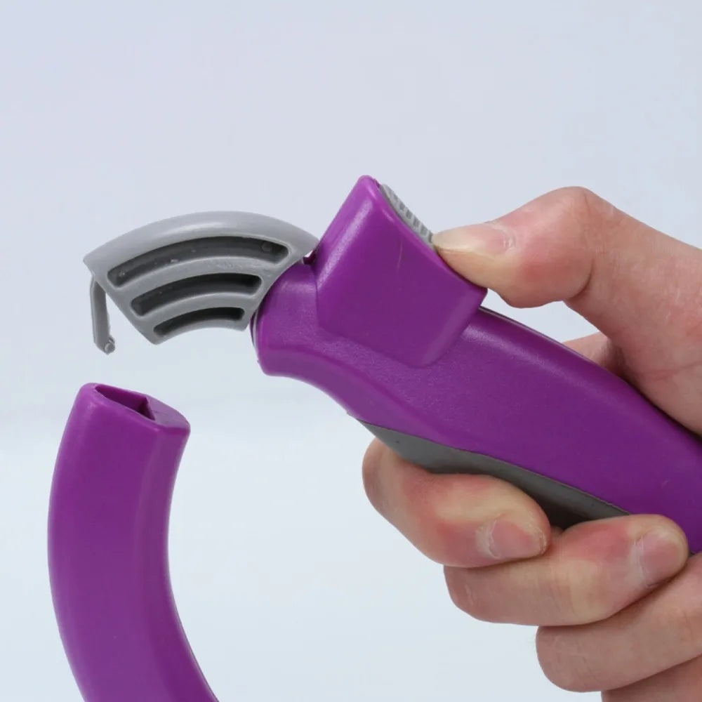 A hand holds a purple D-Type portable grocery bag carrier with a gray opening, showing the device's design.