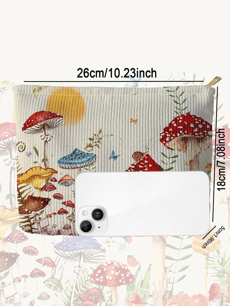 A makeup bag featuring a fairytale mushroom and butterfly print on a beige fabric.