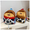 A brown backpack with a yellow plaid fabric and a cow print section, featuring blue straps.