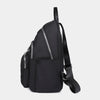Black waterproof women's travel backpack shown from the side.