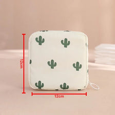 A white fabric pouch with a green cactus pattern, designed for compact sanitary pad storage.